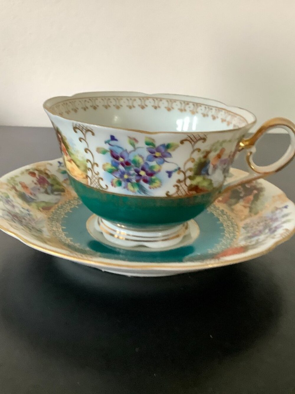 Tea Cup and Saucer Floral / People Pattern